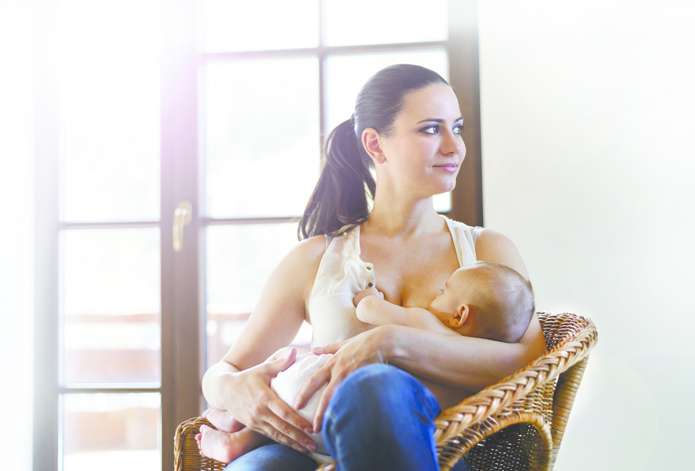 Mother breastfeeding her baby