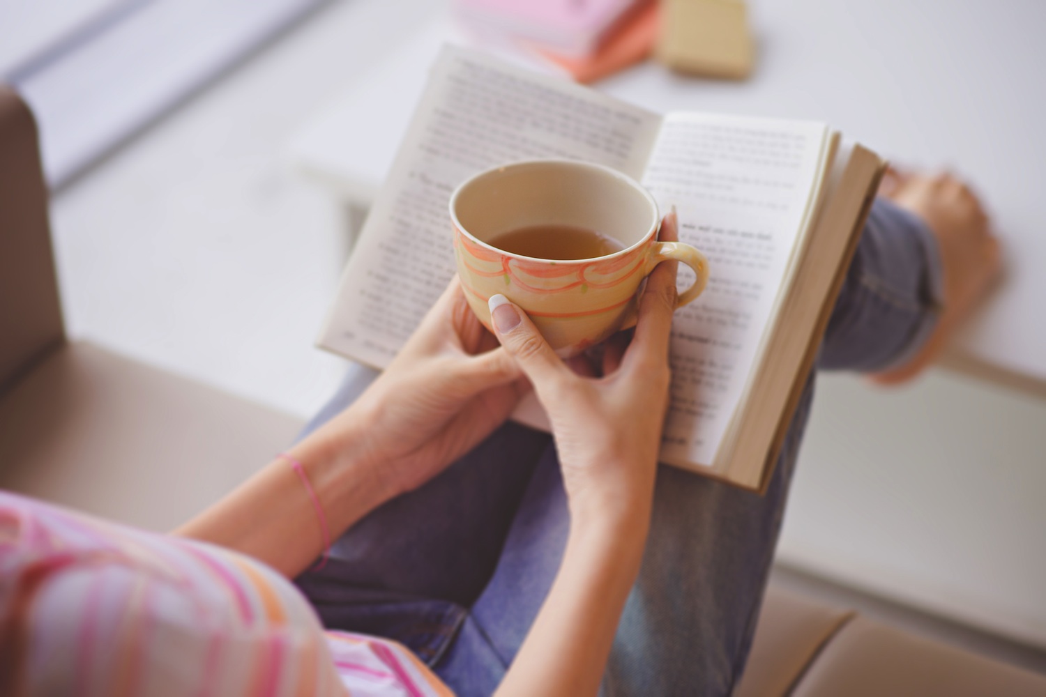 Hands with teacup